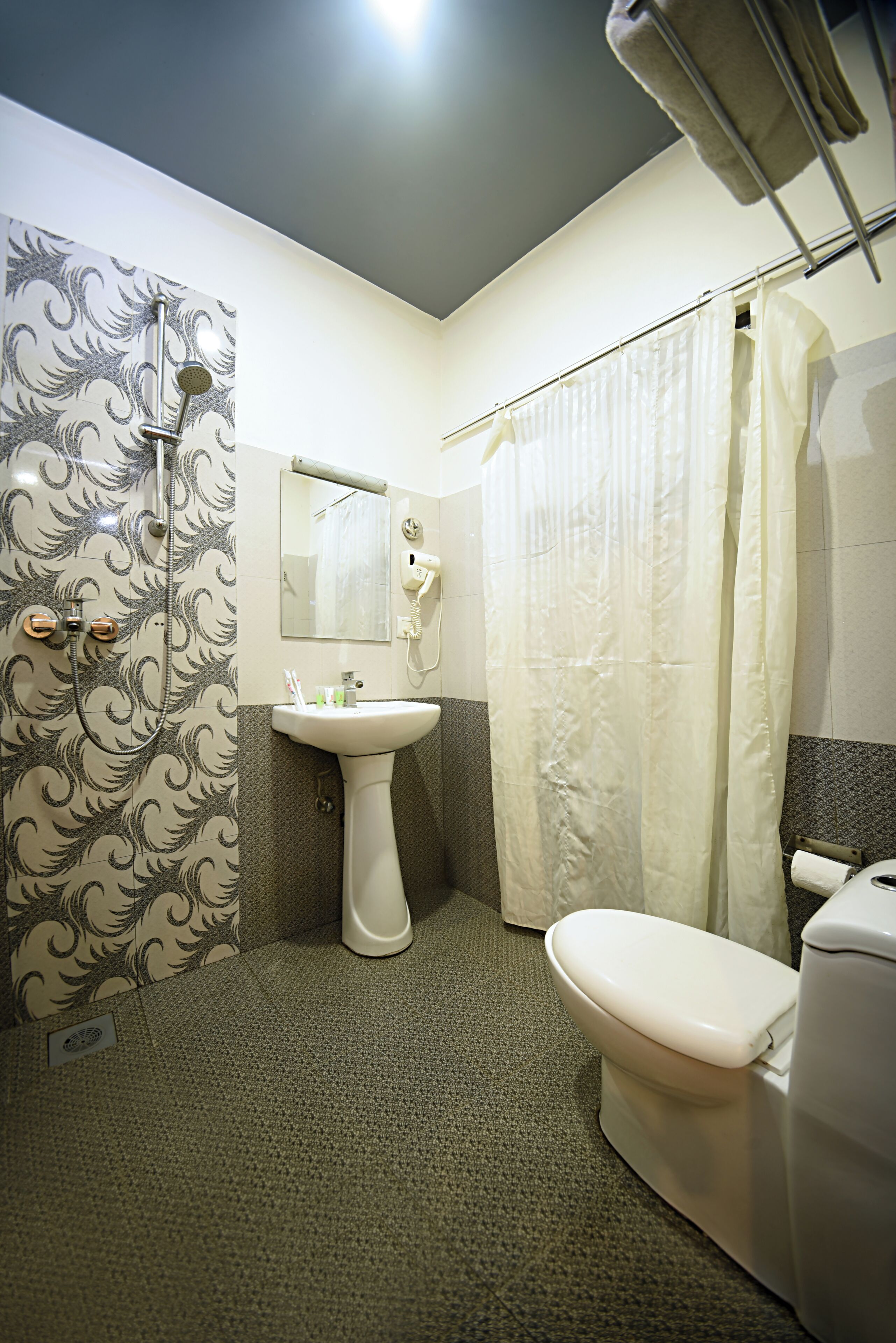 free toiletries, hair dryer, slippers, towels