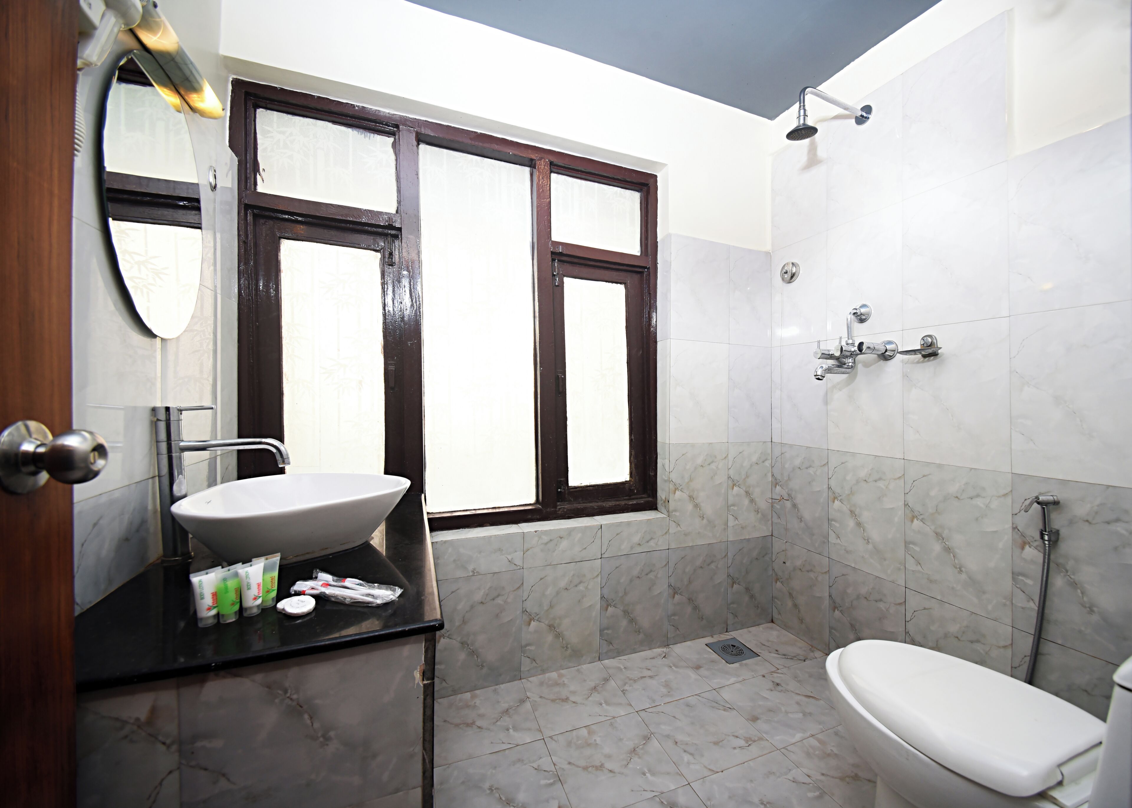 free toiletries, hair dryer, slippers, towels