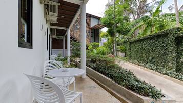 Apartment, 1 King Bed, Ground Floor | Terrace/patio