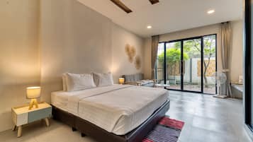 Apartment, 1 King Bed, Ground Floor | 1 bedroom, in-room safe, desk, blackout drapes