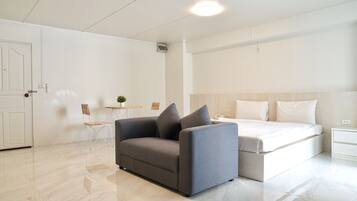 Habitación doble Deluxe | Escritorio, wifi gratis y ropa de cama