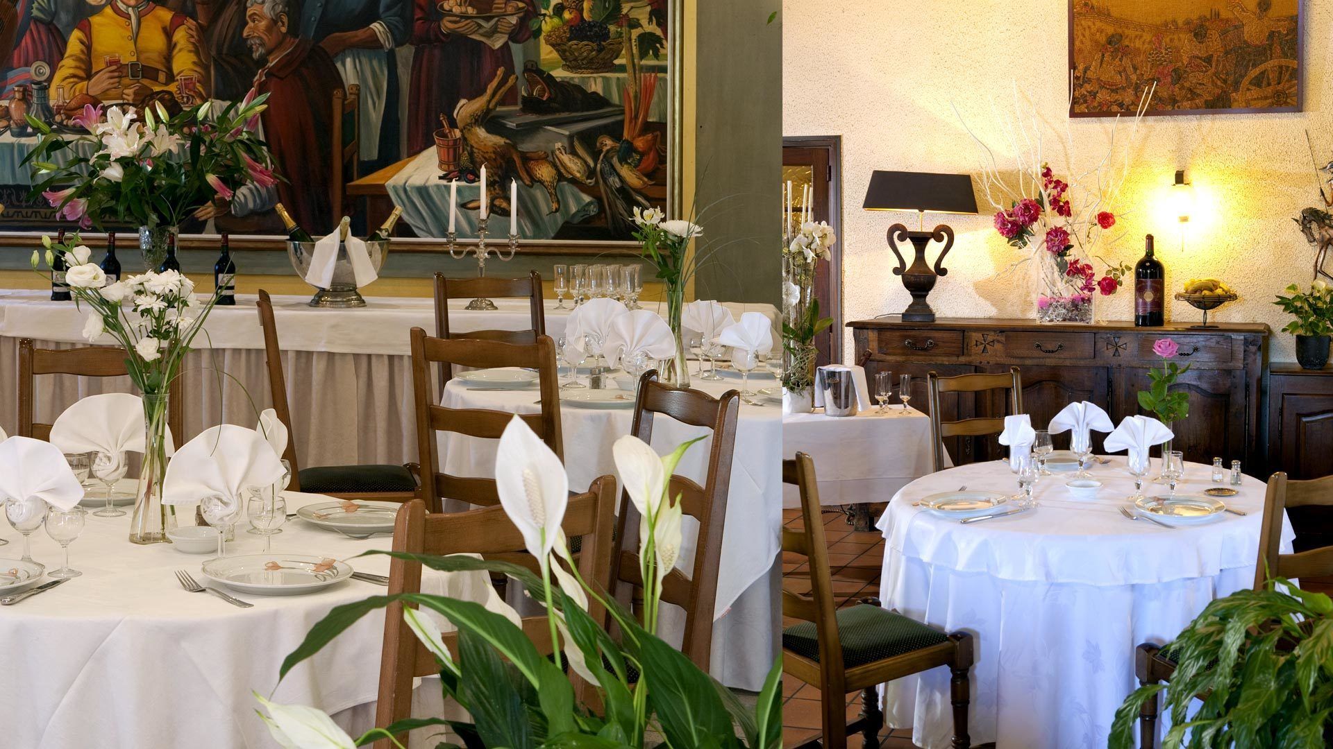A restaurant with round tables set for dining, white tablecloths, and floral centerpieces.