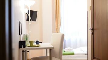 Laptop workspace, iron/ironing board, free WiFi, bed sheets