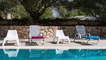 Seasonal outdoor pool, pool umbrellas, pool loungers