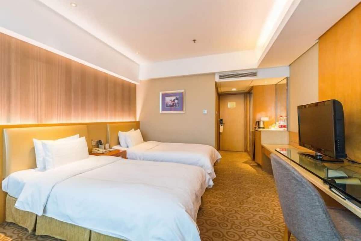 Minibar, coffres-forts dans les chambres, bureau, rideaux occultants