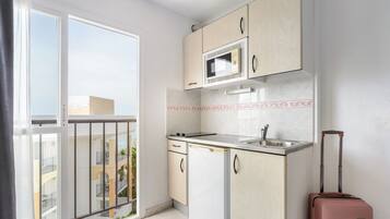 Fridge, microwave, cookware/dishes/utensils, reusable coffee/tea filters