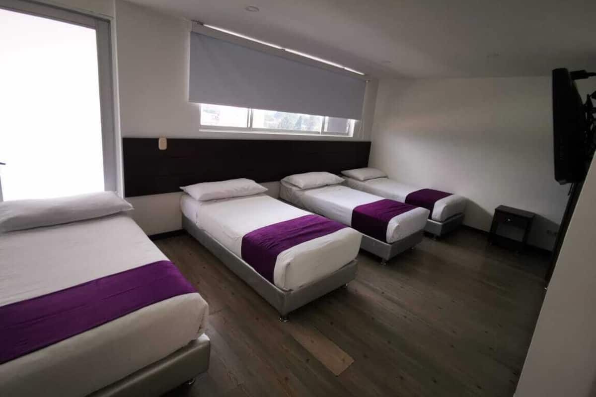 Family Quadruple Room, Mixed Dorm | Minibar, desk, rollaway beds, free WiFi