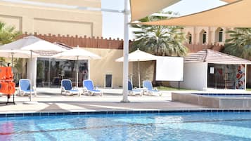 Outdoor pool, pool umbrellas, sun loungers