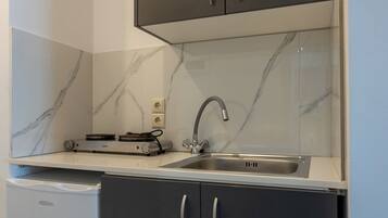 Studio, Sea View (3 adults) | Private kitchen | Fridge, oven, stovetop, coffee/tea maker