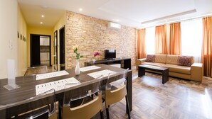 Luxury Apartment, 3 Bedrooms, Kitchen | Living area | LCD TV, DVD player - Apartmány Viktor (Bratislava)