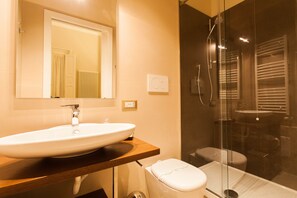 Shower, free toiletries, hair dryer, towels