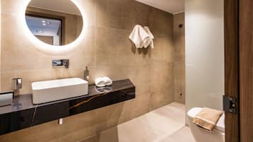 Deluxe Suite, 1 Bedroom, Pool View | Bathroom | Free toiletries, hair dryer, towels, soap