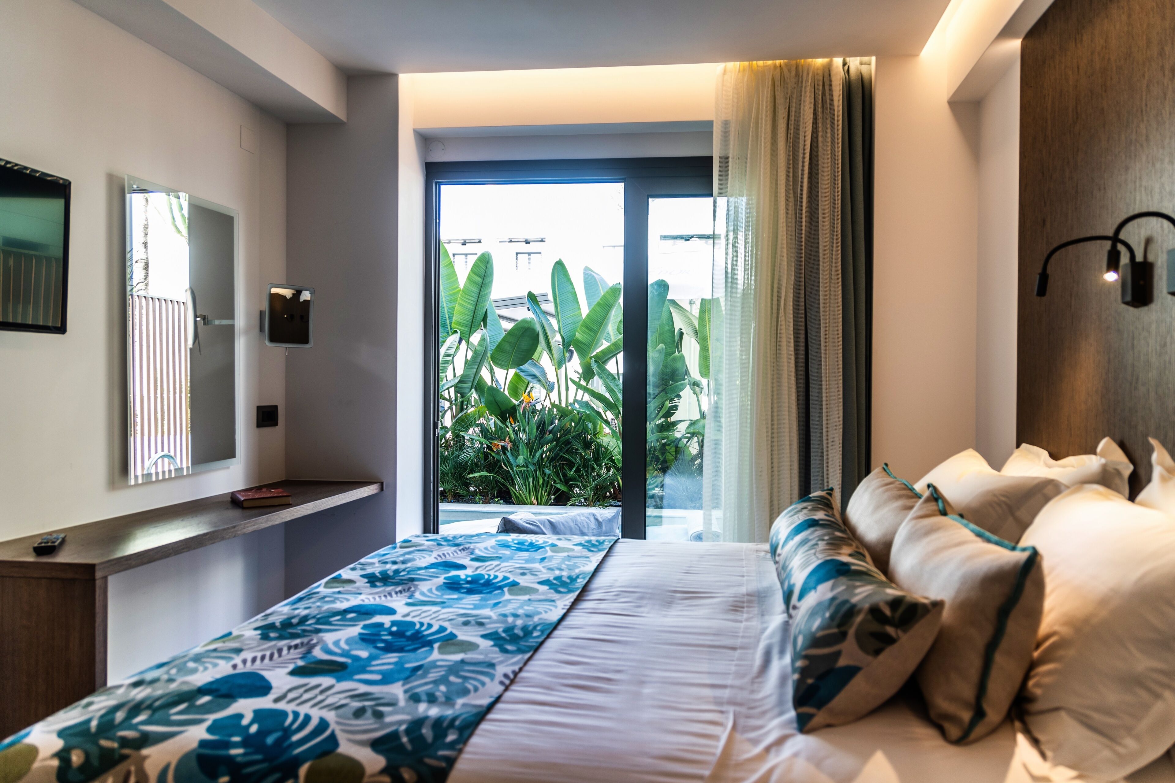 Deluxe Suite, 1 Bedroom, Pool View | Pillowtop beds, in-room safe, blackout drapes, soundproofing