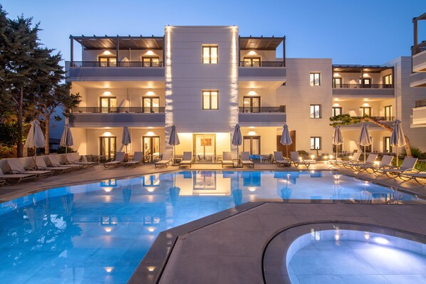 2 outdoor pools, pool umbrellas, sun loungers