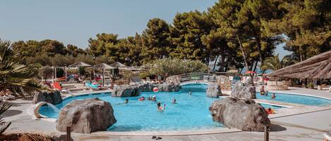 Seasonal outdoor pool, pool umbrellas, pool loungers