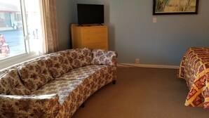 Quarto, 2 camas de casal, para fumantes | Área de estar