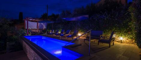 Seasonal outdoor pool, pool umbrellas, pool loungers