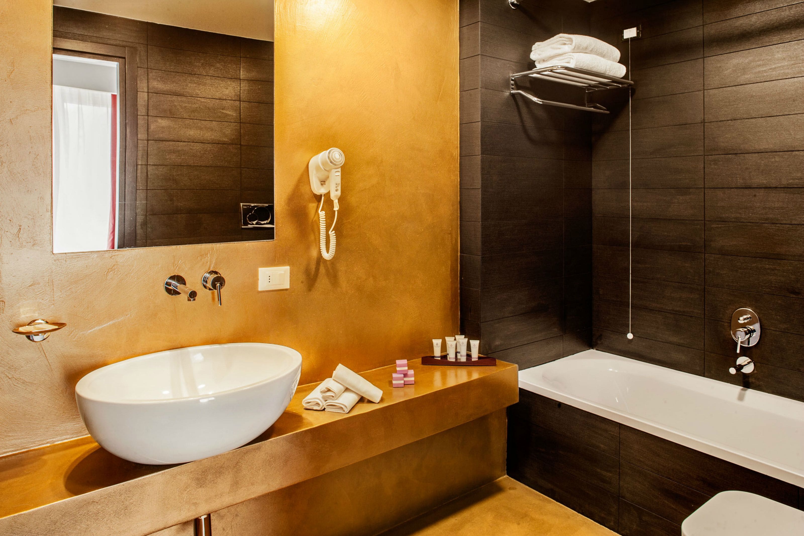 free toiletries, hair dryer, bidet, towels