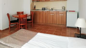 Fridge, electric kettle, toaster, cookware/dishes/utensils