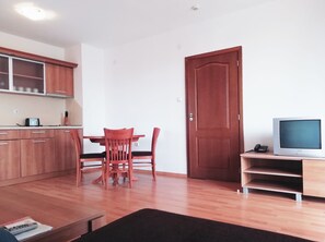 Comfort Apartment, 1 Bedroom, Kitchenette | Living area | 22-inch TV with cable channels - Apart-hotel Efir (Sunny Beach)
