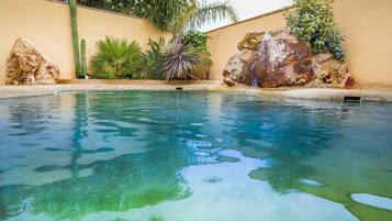 Seasonal outdoor pool, pool loungers