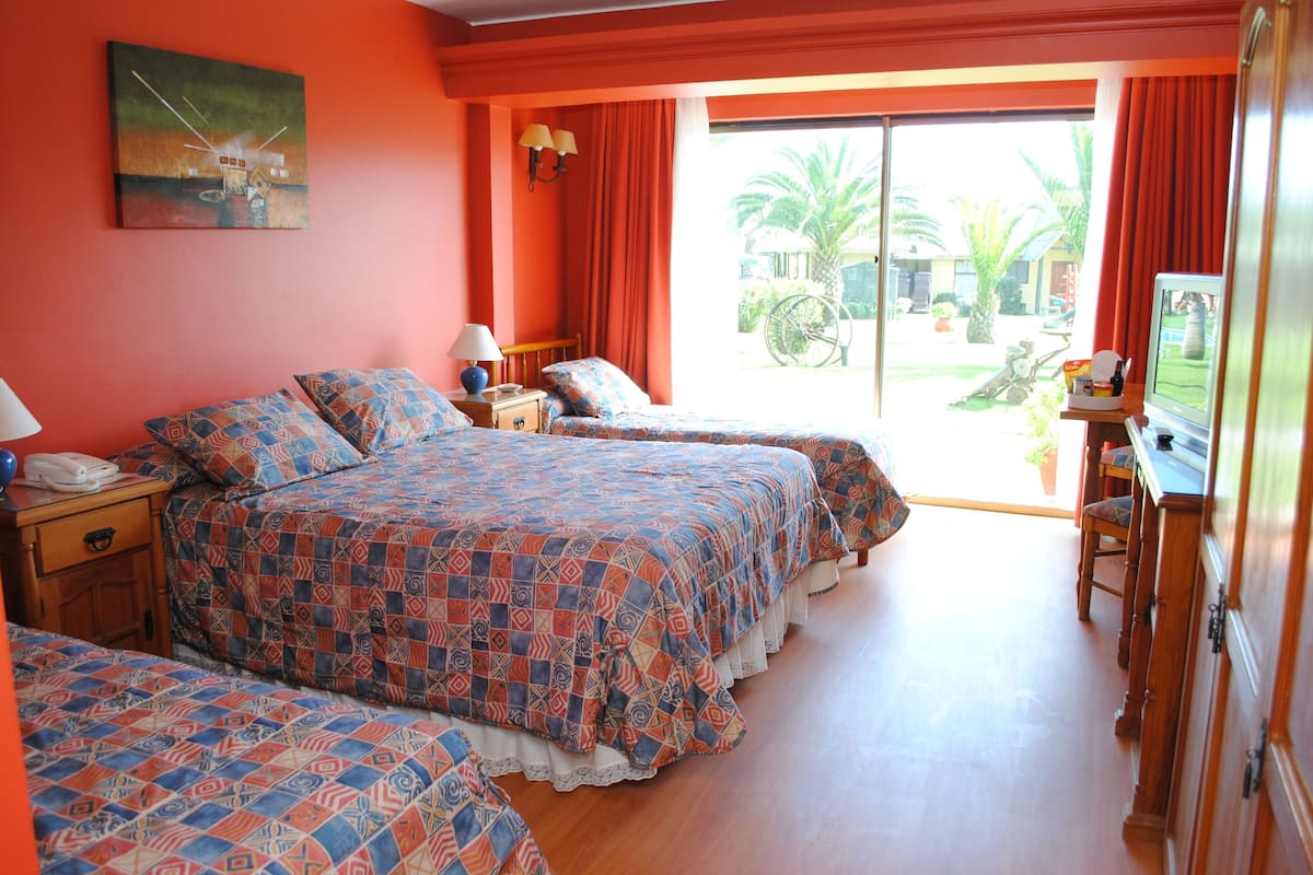 Standard Quadruple Room | Minibar, in-room safe, cribs (free), rollaway beds (surcharge)