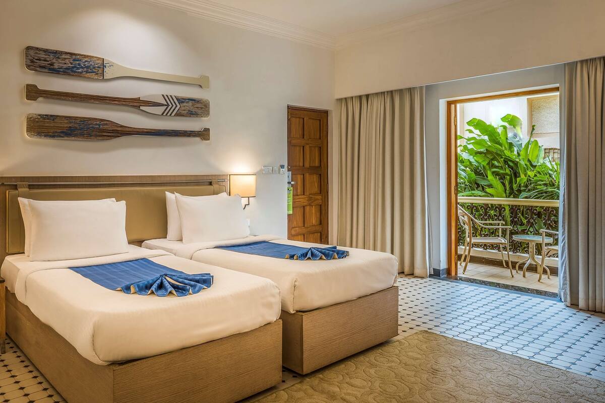 Ropa de cama de alta calidad, minibar, caja fuerte