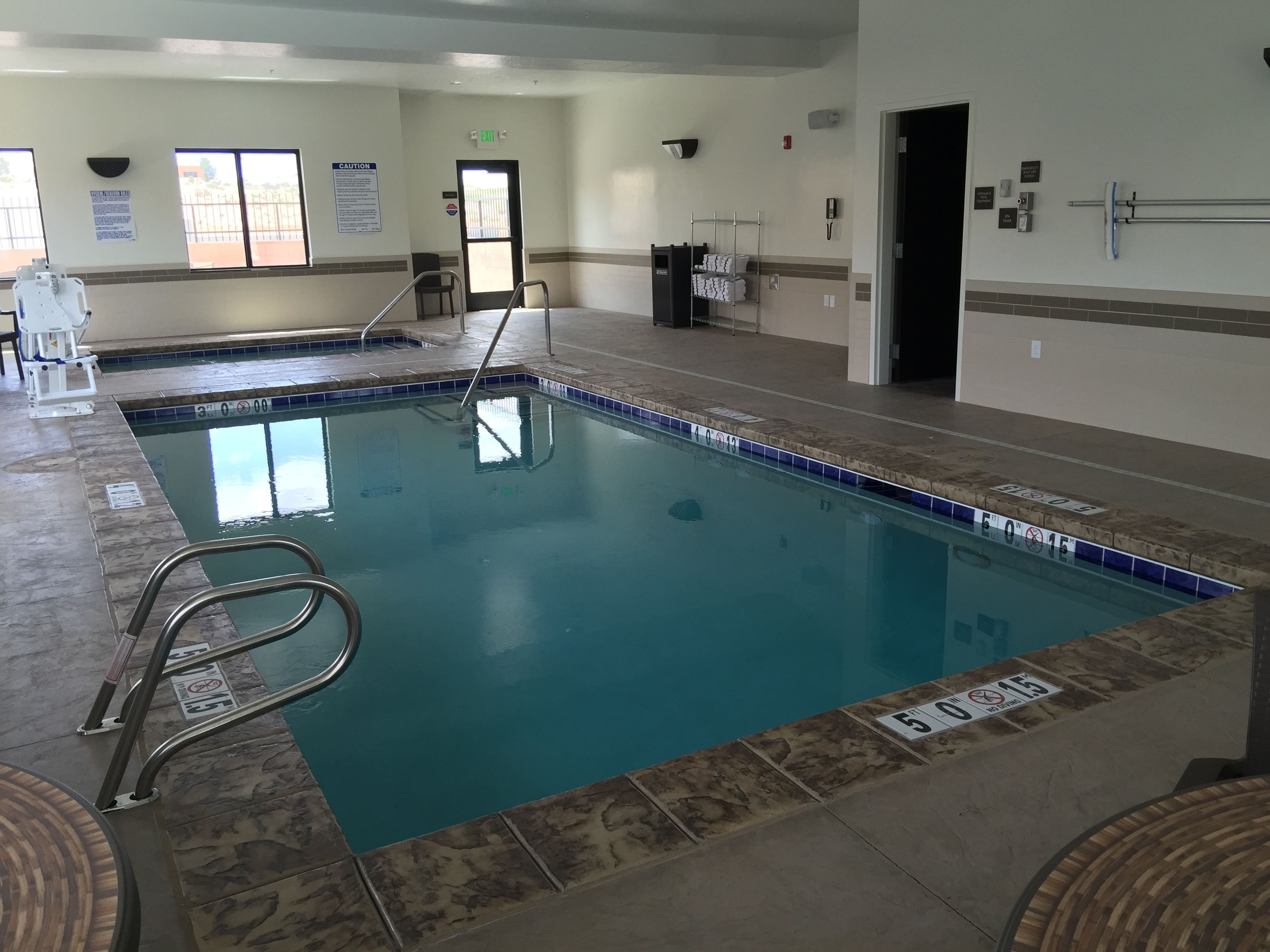 indoor pool, open 8:00 am to 10:00 pm, pool loungers