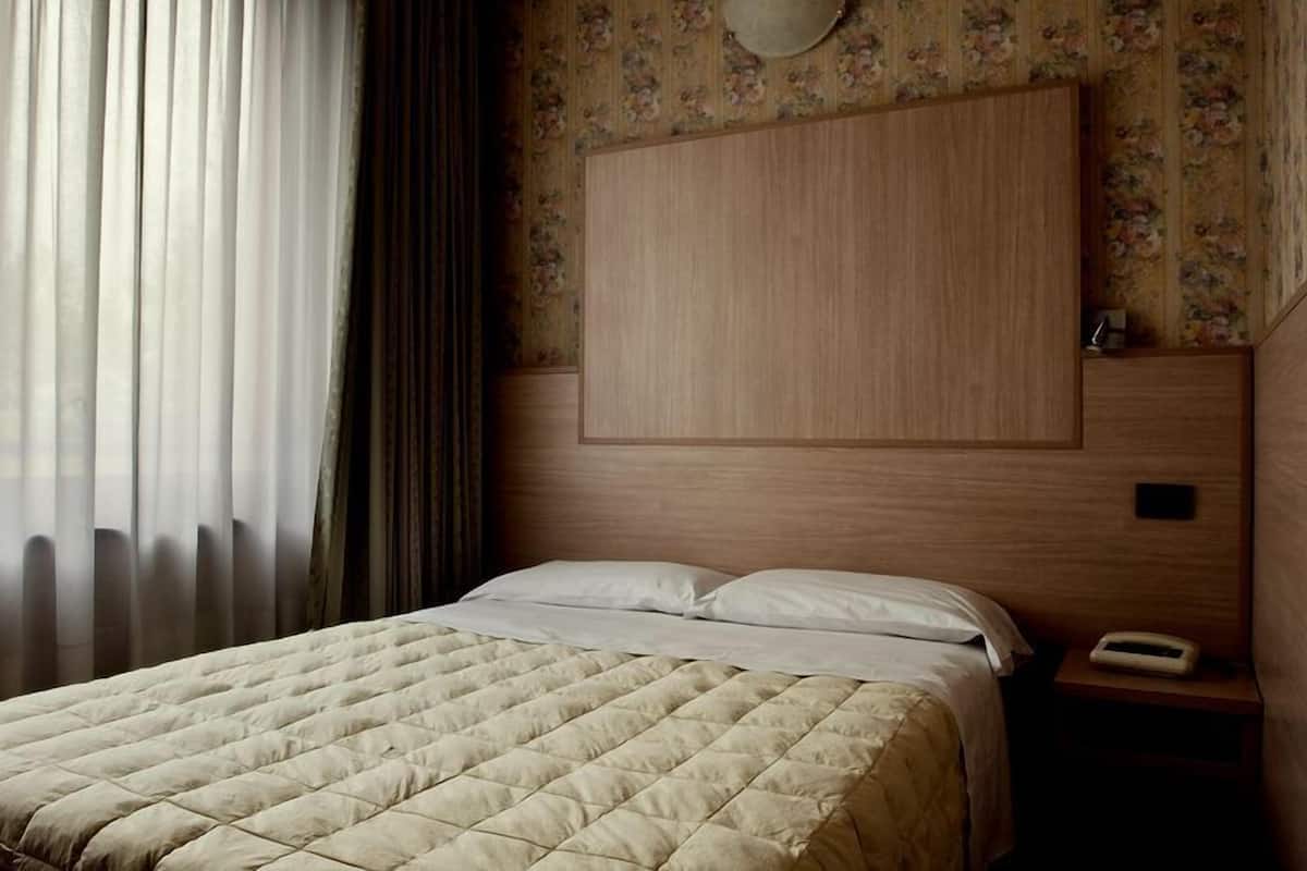 Habitación individual | Ropa de cama de alta calidad, minibar, escritorio
