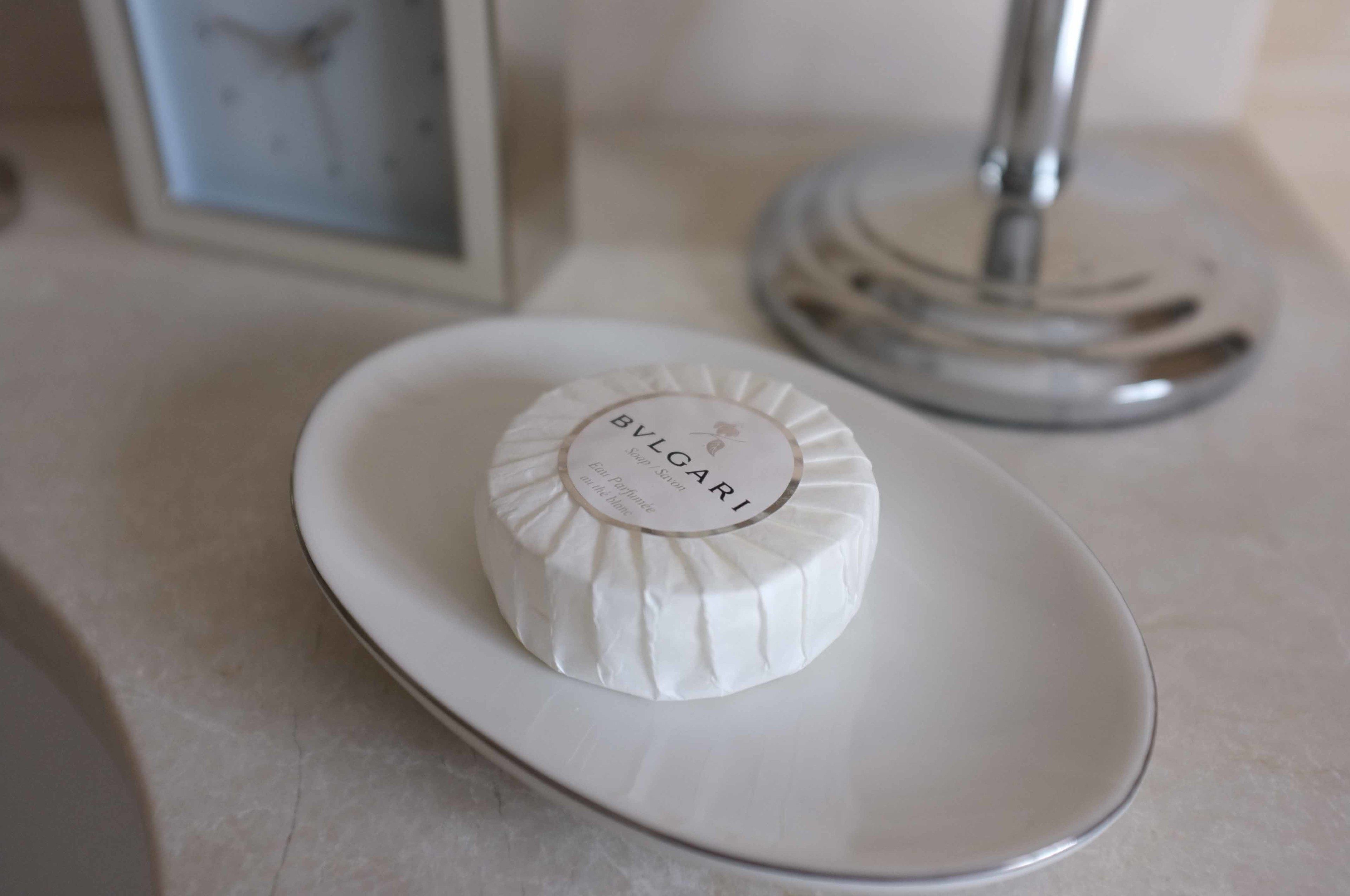 A white round object with text on a white plate.