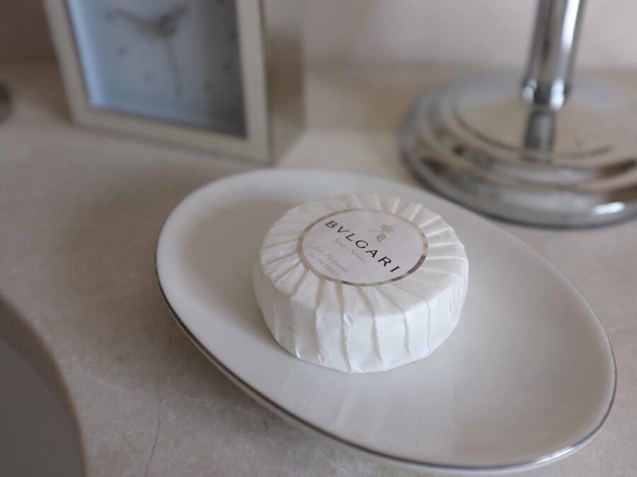 A white round object with text on a white plate.
