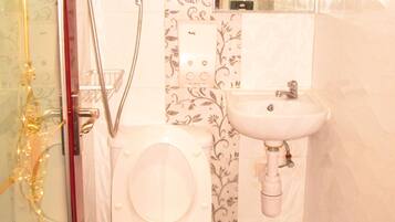 Shower, free toiletries, hair dryer, slippers