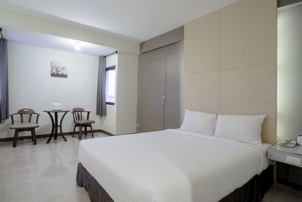 标准双人房 | 迷你吧、办公桌、折叠床/加床（额外收费）、免费 WiFi