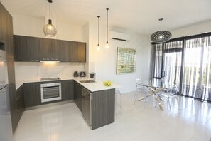 Fridge, microwave, coffee/tea maker, electric kettle