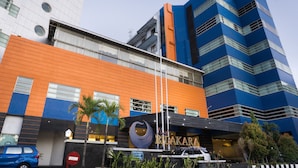 A modern building with a prominent sign reading "BIDAKARA".