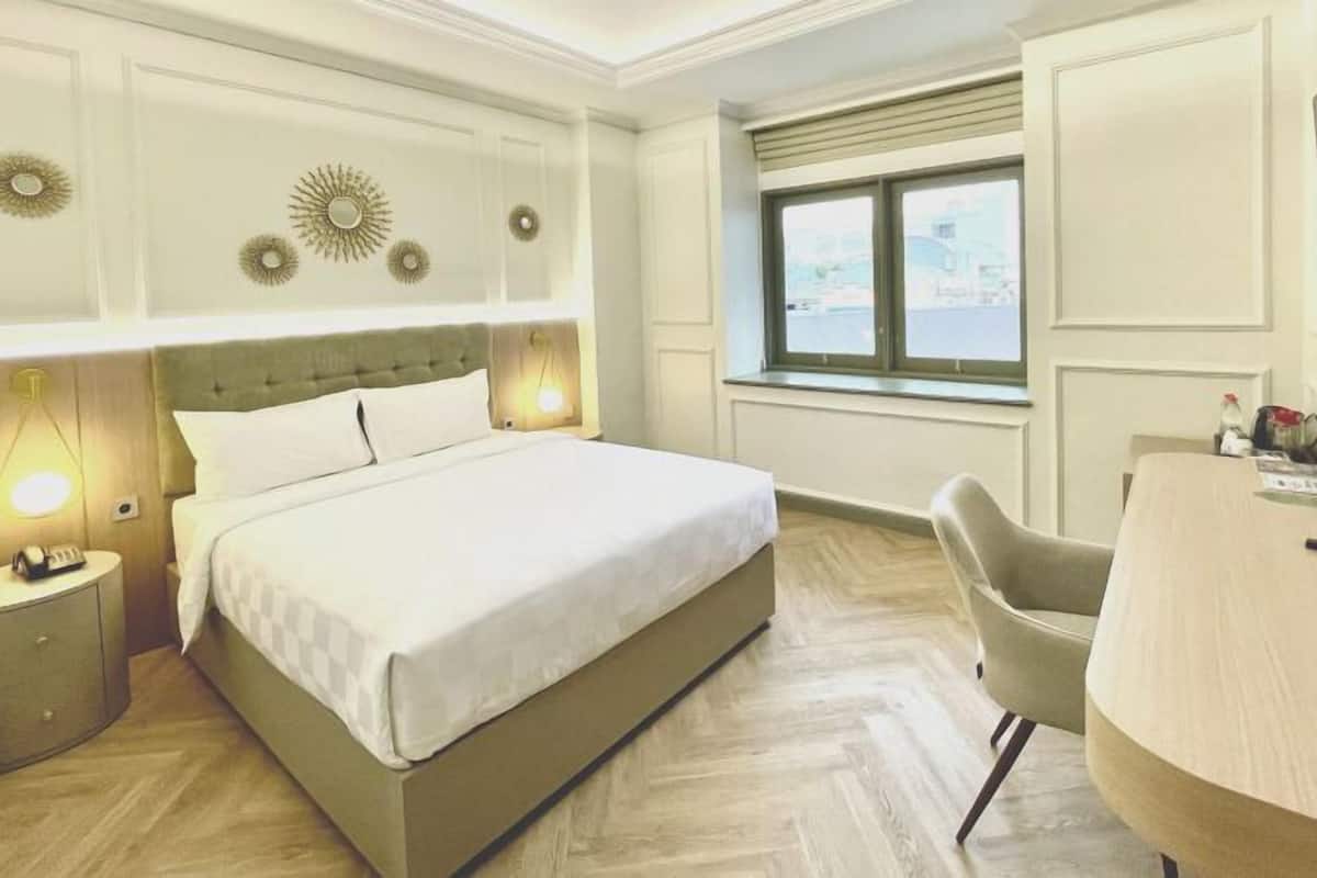 Habitación Deluxe | Escritorio, wifi gratis y ropa de cama