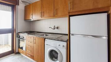 Fridge, stovetop, cookware/dishes/utensils