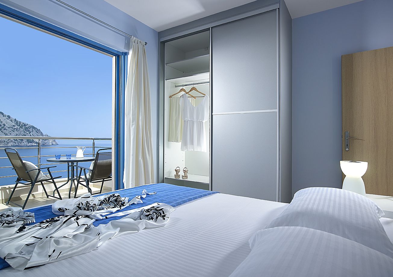 family suite, 2 bedrooms, sea view | 1 bedroom, premium bedding, in-room safe, desk