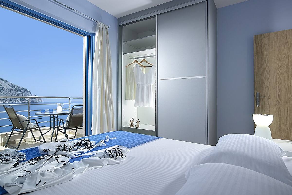 family suite, 2 bedrooms, sea view | 1 bedroom, premium bedding, in-room safe, desk