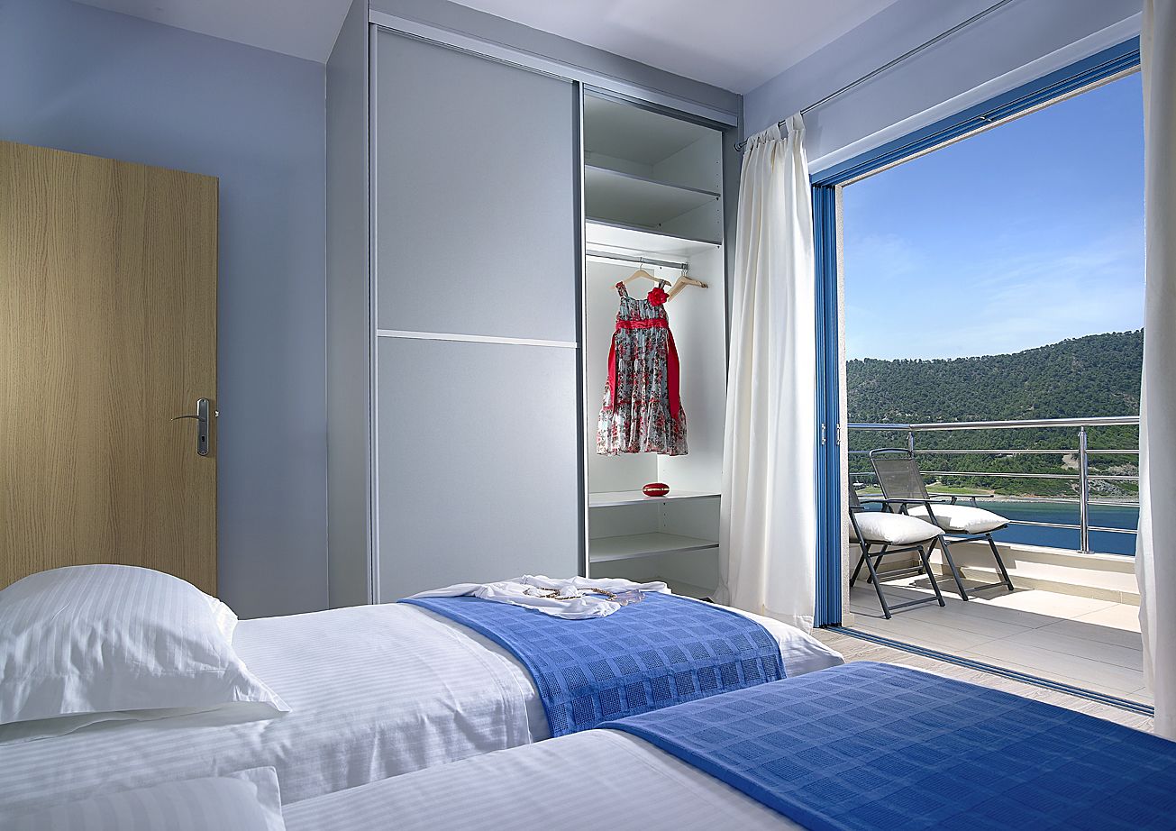 family suite, 2 bedrooms, sea view | 1 bedroom, premium bedding, in-room safe, desk