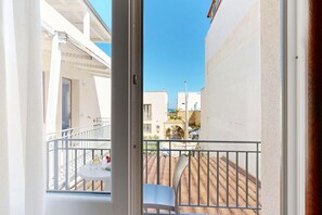 Quarto triplo luxo, sacada | Terraço/pátio