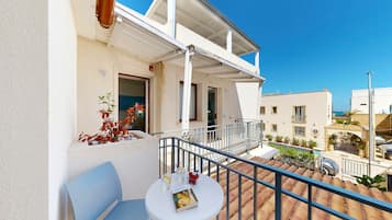Deluxe Triple Room, Balcony | Terrace/patio