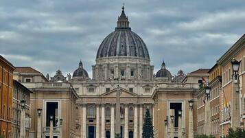 A large historic building with a prominent dome and classical architecture.