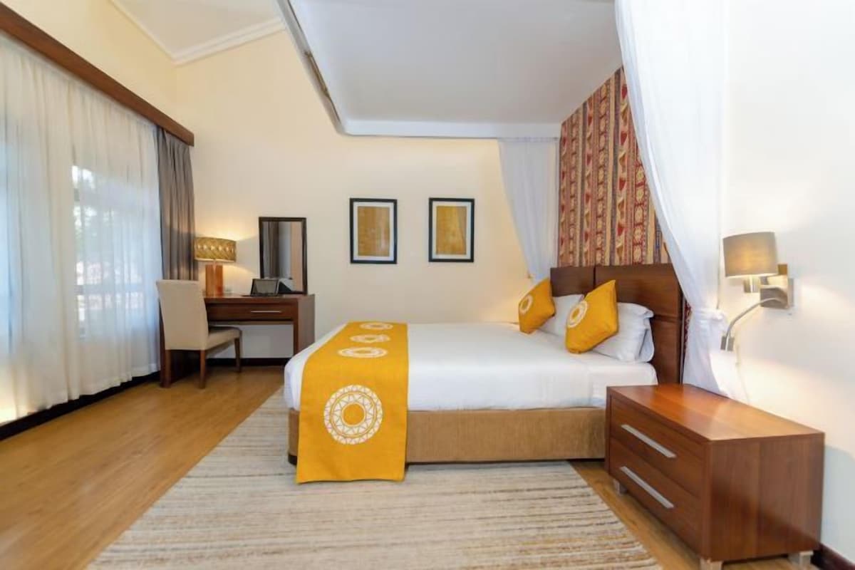 Premium bedding, down duvets, pillow-top beds, in-room safe
