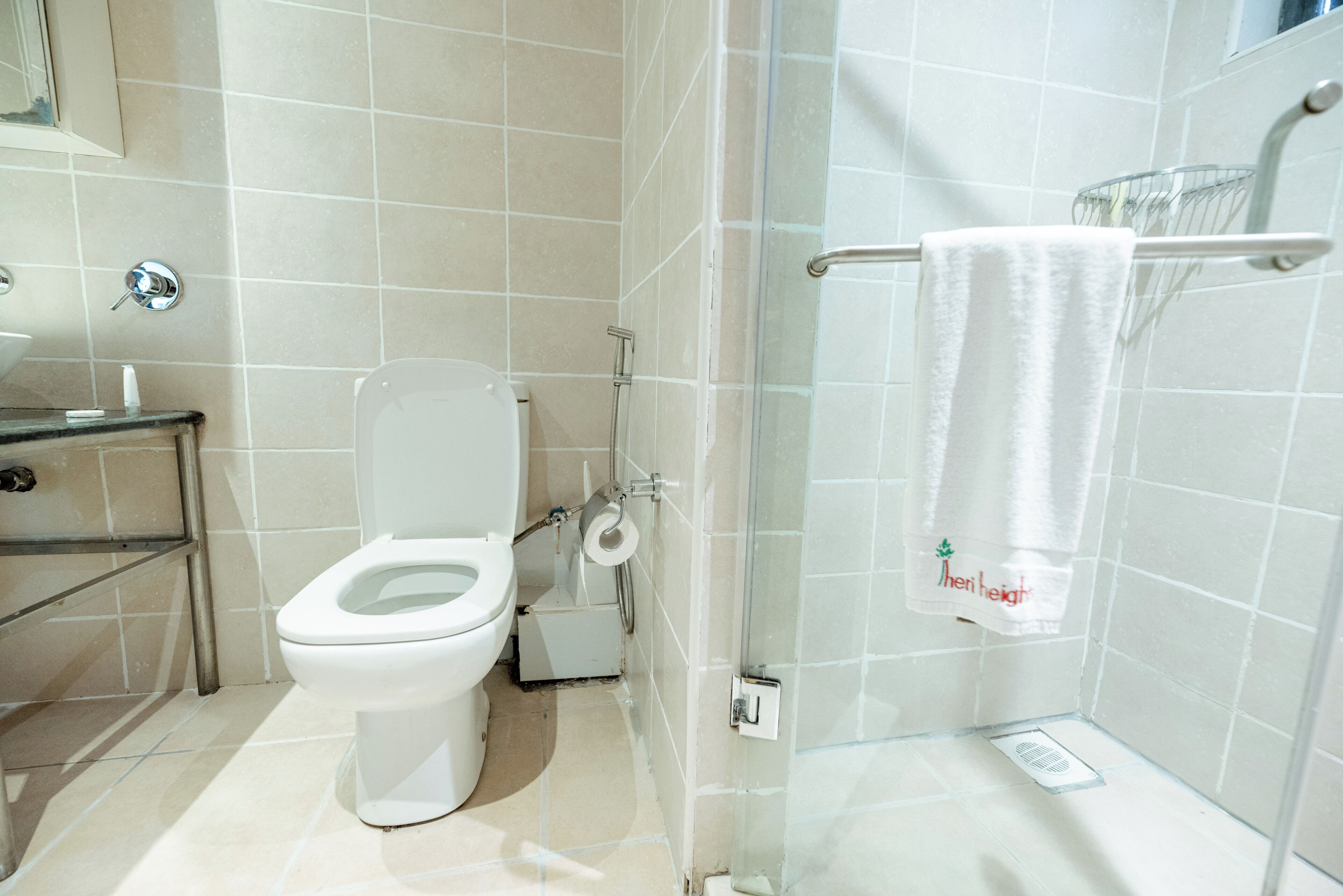 Superior Apartment, Multiple Beds, Non Smoking | Bathroom | Shower, rainfall showerhead, free toiletries, hair dryer