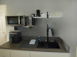 Family Suite, 1 Bedroom, Ocean View | Private kitchen | Fridge, microwave, coffee/tea maker