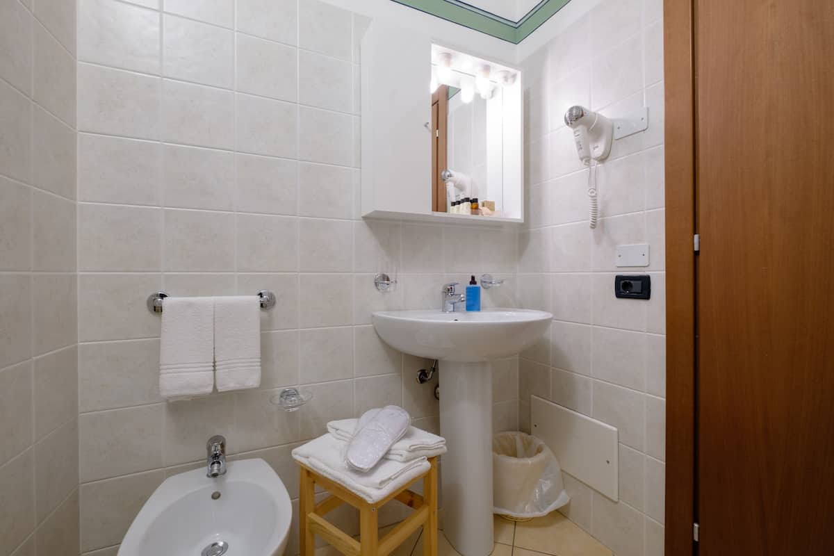 premium bedding, down duvets, minibar, in-room safe