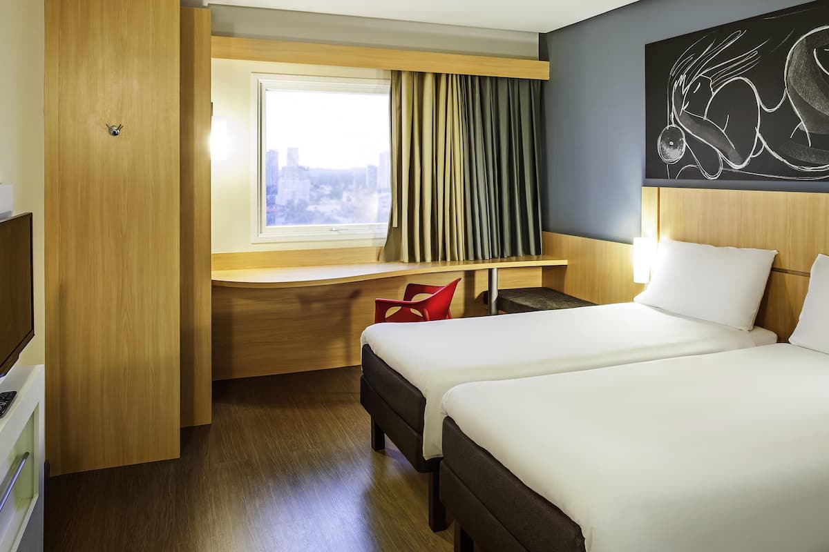 Standard Room, 2 Twin Beds | Minibar, in-room safe, desk, blackout drapes