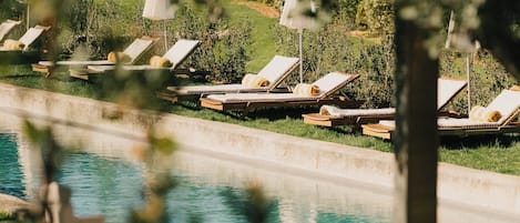 2 outdoor pools, pool umbrellas, sun loungers