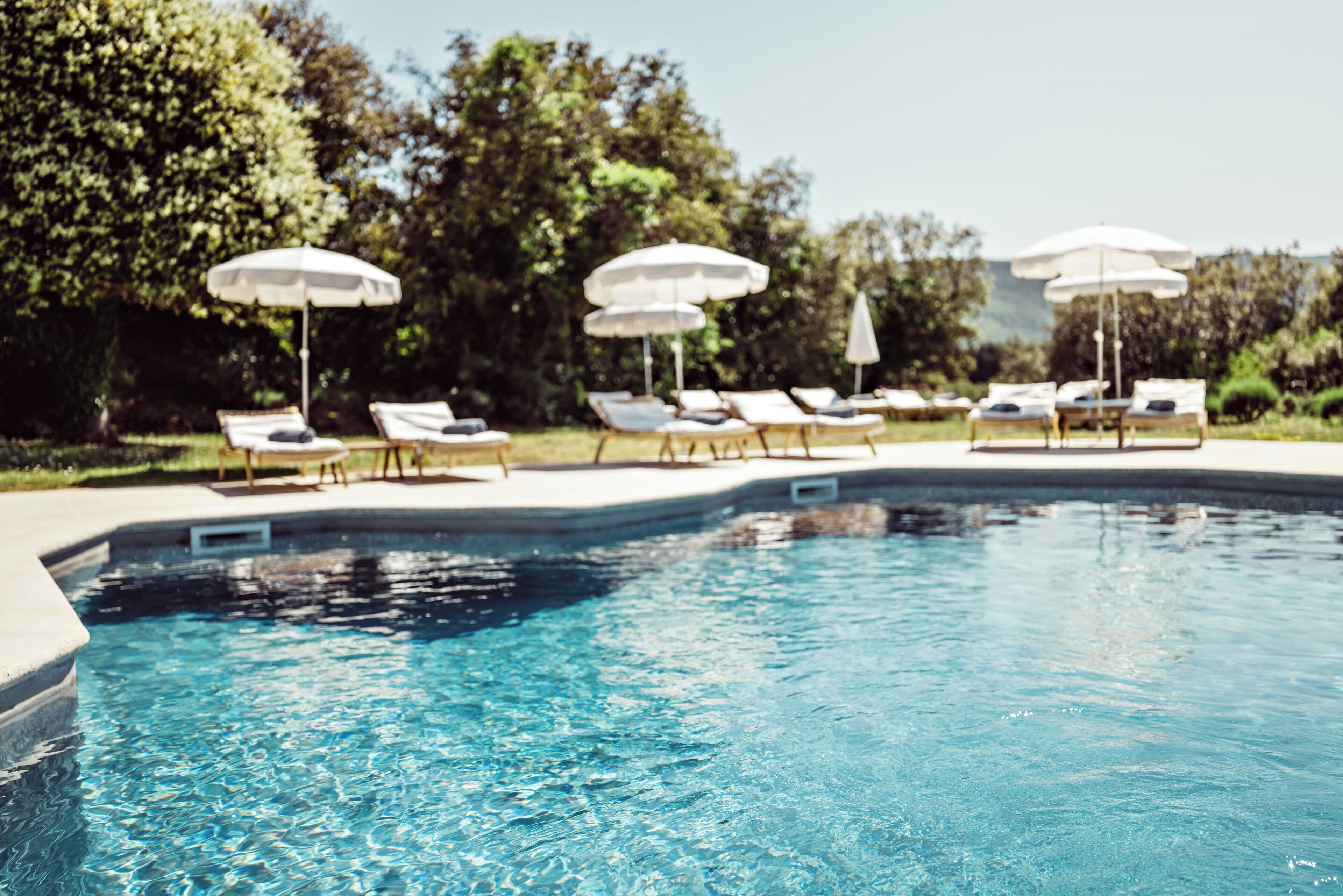 2 outdoor pools, pool umbrellas, pool loungers